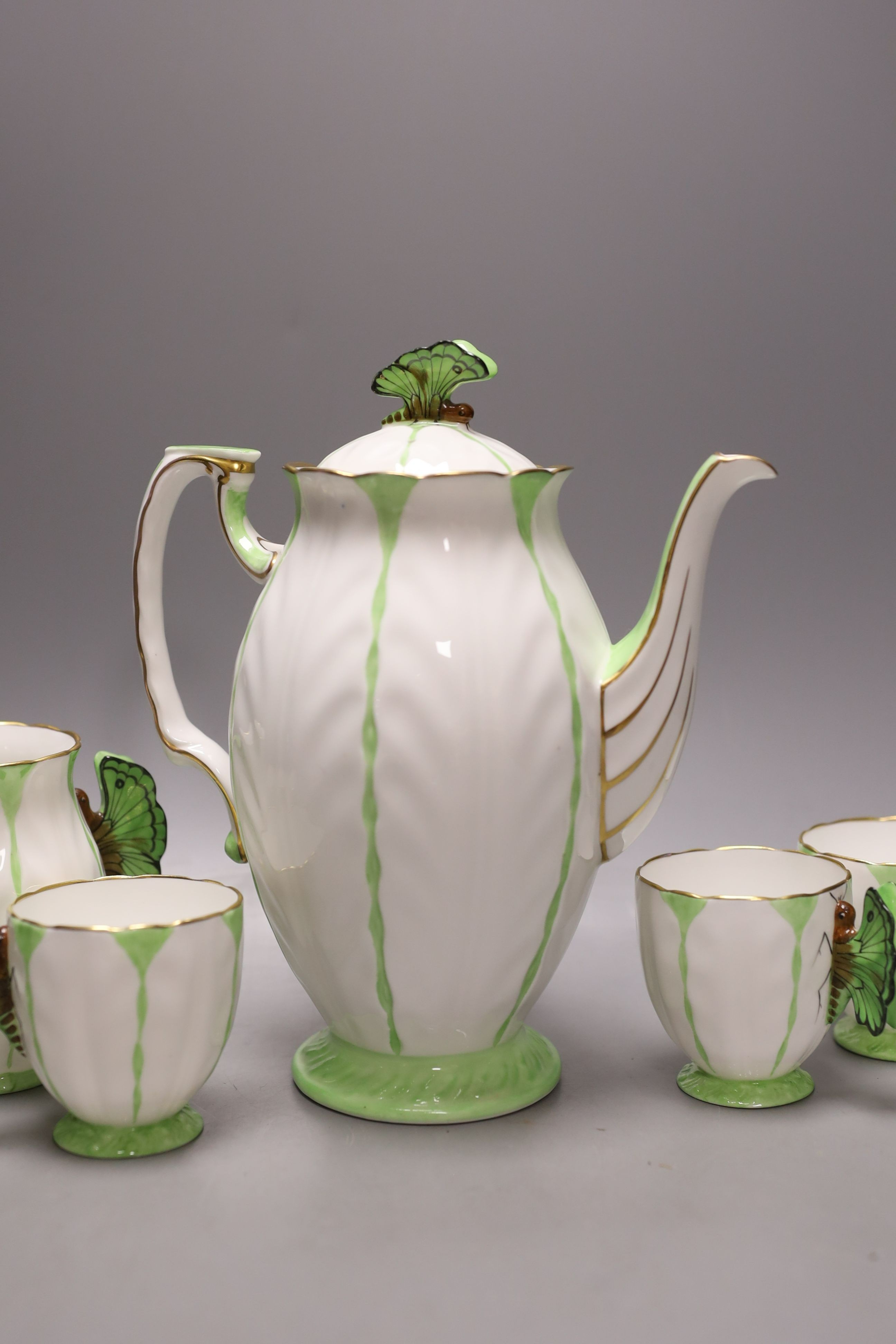 An Aynsley green and white butterfly handled part tea service